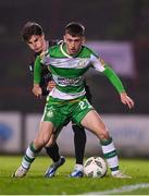 3 May 2024; Darragh Burns of Shamrock Rovers and Paddy Kirk of Bohemians during the SSE Airtricity Men's Premier Division match between Bohemians and Shamrock Rovers at Dalymount Park in Dublin. Photo by Stephen McCarthy/Sportsfile