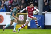 3 May 2024; Ruairi Keating of St Patrick's Athletic in action against Luke Heeney of Drogheda United during the SSE Airtricity Men's Premier Division match between St Patrick's Athletic and Drogheda United at Richmond Park in Dublin. Photo by Shauna Clinton/Sportsfile