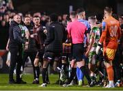 3 May 2024; Players and staff from both side after the SSE Airtricity Men's Premier Division match between Bohemians and Shamrock Rovers at Dalymount Park in Dublin. Photo by Stephen McCarthy/Sportsfile