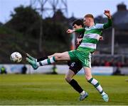 3 May 2024; Darragh Nugent of Shamrock Rovers in action against James Clarke of Bohemians during the SSE Airtricity Men's Premier Division match between Bohemians and Shamrock Rovers at Dalymount Park in Dublin. Photo by Stephen McCarthy/Sportsfile