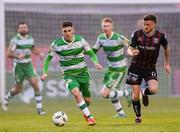 3 May 2024; Dylan Watts of Shamrock Rovers in action against Adam McDonnell of Bohemians during the SSE Airtricity Men's Premier Division match between Bohemians and Shamrock Rovers at Dalymount Park in Dublin. Photo by Stephen McCarthy/Sportsfile