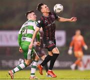 3 May 2024; Dayle Rooney of Bohemians in action against Darragh Burns of Shamrock Rovers during the SSE Airtricity Men's Premier Division match between Bohemians and Shamrock Rovers at Dalymount Park in Dublin. Photo by Stephen McCarthy/Sportsfile