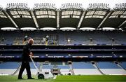 4 May 2024; Groundsman Darren Jepson paints the lines before the Investec Champions Cup semi-final match between Leinster and Northampton Saints at Croke Park in Dublin. Photo by Harry Murphy/Sportsfile