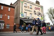 4 May 2024; Leinster supporters make their way past Gill's pub on Jones' Road, Dublin, before the Investec Champions Cup semi-final match between Leinster and Northampton Saints at Croke Park in Dublin. Photo by Sam Barnes/Sportsfile