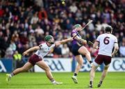 4 May 2024; Conor McDonald of Wexford scores a point despite Fintan Burke of Galway during the Leinster GAA Hurling Senior Championship Round 3 match between Wexford and Galway at Chadwicks Wexford Park in Wexford. Photo by David Fitzgerald/Sportsfile