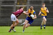 4 May 2024; Robert Heneghan of Roscommon in action against Mark Mannion of Galway during the Connacht GAA Football U20 Championship final match between Roscommon and Galway at Hastings Insurance MacHale Park in Castlebar, Mayo. Photo by Ben McShane/Sportsfile