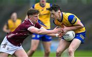 4 May 2024; Shane McGinley of Roscommon is tackled by Mark Mannion of Galway during the Connacht GAA Football U20 Championship final match between Roscommon and Galway at Hastings Insurance MacHale Park in Castlebar, Mayo. Photo by Ben McShane/Sportsfile