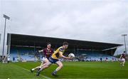 4 May 2024; Bobby Nugent of Roscommon in action against Brian Noone of Galway during the Connacht GAA Football U20 Championship final match between Roscommon and Galway at Hastings Insurance MacHale Park in Castlebar, Mayo. Photo by Ben McShane/Sportsfile