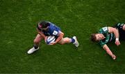 4 May 2024; James Lowe of Leinster evades the tackle of Northampton Saints' James Ramm on his way to scoring his side's first try during the Investec Champions Cup semi-final match between Leinster and Northampton Saints at Croke Park in Dublin. Photo by Stephen McCarthy/Sportsfile