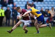 4 May 2024; Fionn Mac Donnacha of Galway is tackled by Conor Harley of Roscommon during the Connacht GAA Football U20 Championship final match between Roscommon and Galway at Hastings Insurance MacHale Park in Castlebar, Mayo. Photo by Ben McShane/Sportsfile