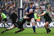 4 May 2024; Joe McCarthy of Leinster is tackled by Sam Graham, left, and Curtis Langdon of Northampton Saints during the Investec Champions Cup semi-final match between Leinster and Northampton Saints at Croke Park in Dublin. Photo by Harry Murphy/Sportsfile
