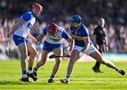 4 May 2024; Jack Fagan of Waterford, supported by team-mate Tadhg de Búrca, left, in action against Jason Forde of Tipperary during the Munster GAA Hurling Senior Championship Round 3 match between Waterford and Tipperary at Walsh Park in Waterford. Photo by Piaras Ó Mídheach/Sportsfile