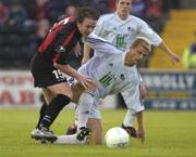 29 July 2004; Dessie Baker, Longford Town, is tackled by Daniel Hasler, FC Vaduz. UEFA Cup, 1st Qualifying Round, 2nd Leg, Longford Town v FC Vaduz, Flancare Park, Longford. Picture credit; Ray McManus / SPORTSFILE