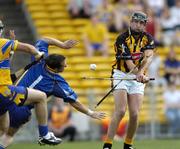 31 July 2004; Eddie Brennan, Kilkenny, in action against David Fitzgerald (1) and Alan Markham, Clare. Guinness All-Ireland Hurling Championship Quarter Final Replay, Clare v Kilkenny, Semple Stadium, Thurles, Co. Tipperary. Picture credit; Brendan Moran / SPORTSFILE