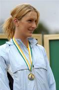 25 July 2004; Deirdre Ryan, UCD AC, with her medal after winning the Women's High Jump Final. AAI Senior Track and Field Championships, Morton Stadium, Santry, Dublin. Picture credit; Brendan Moran / SPORTSFILE