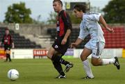 29 July 2004; Sean Dillon, Longford Town, is tackled by Marius Zarn, FC Vaduz. UEFA Cup, 1st Qualifying Round, 2nd Leg, Longford Town v FC Vaduz, Flancare Park, Longford. Picture credit; Ray McManus / SPORTSFILE