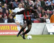 29 July 2004; Eric Lavine, Longford Town, is tackled by Eduardo Dos Santos, FC Vaduz. UEFA Cup, 1st Qualifying Round, 2nd Leg, Longford Town v FC Vaduz, Flancare Park, Longford. Picture credit; Ray McManus / SPORTSFILE