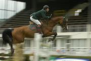 4 August 2004; Ireland's Cian O'Connor on Irish Independent Annabella during the Irish Sports Council Classic. Dublin Horse Show, Main Arena, RDS, Dublin. Picture credit; Brendan Moran / SPORTSFILE