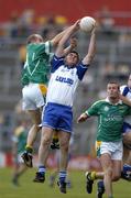31 July 2004; David Ryan, Waterford, in action against John Cullen, Leitrim. All-Ireland Junior Football Championship Final, Leitrim v Waterford, Semple Stadium, Thurles, Co. Tipperary. Picture credit; Brendan Moran / SPORTSFILE
