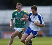 31 July 2004; Sean Dempsey, Waterford, in action against Karl Scollan, Leitrim. All-Ireland Junior Football Championship Final, Leitrim v Waterford, Semple Stadium, Thurles, Co. Tipperary. Picture credit; Brendan Moran / SPORTSFILE