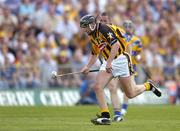 31 July 2004; Eddie Brennan, Kilkenny, in action against David Hoey, Clare. Guinness All-Ireland Hurling Championship Quarter Final Replay, Clare v Kilkenny, Semple Stadium, Thurles, Co. Tipperary. Picture credit; Brendan Moran / SPORTSFILE