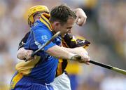 31 July 2004; David Fitzgerald, Clare, in action against James ' Cha ' Fitzpatrick, Kilkenny. Guinness All-Ireland Hurling Championship Quarter Final Replay, Clare v Kilkenny, Semple Stadium, Thurles, Co. Tipperary. Picture credit; Brendan Moran / SPORTSFILE