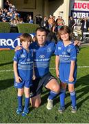 14 September 2013; Leinster's Shane Jennings with matchday mascots Eoin Cullen, age 9, from the NUIM Barnhall RFC club, right, and Max Kennedy, age 8, from Maynooth, Co. Kildare, ahead of the game. Celtic League 2013/14, Round 2, Leinster v Ospreys, RDS, Ballsbridge, Dublin. Picture credit: Stephen McCarthy / SPORTSFILE
