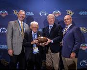 14 September 2013; Former US Ambassador to Ireland and Chairman of the Pittsburgh Steelers Dan Rooney, second from left, joined Ard Stiúrthoir of the GAA Páraic Duffy, Dave Joyner, right, Director of Athletics, Penn State University, and Tod Stansbury, left, Director of Athletics, UCF, in Beaver Stadium, Pennsylvania, to officially launch the Croke Park Classic in the US. Duffy announced to the almost 100,000 strong audience of Penn State and UCF fans, that the winner of the Croke Park Classic would be presented with the Dan Rooney Trophy, named in honour of Rooney. Beaver Stadium, Penn State University, Pennsylvania, United States. Picture credit: Mark Selders / SPORTSFILE