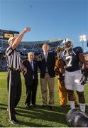 14 September 2013; Former US Ambassador to Ireland and Chairman of the Pittsburgh Steelers Dan Rooney joined Ard Stiúrthoir of the GAA Páraic Duffy and the Penn State University mascot, the Nittany Lion, on the pitch last night in Beaver Stadium, Pennsylvania, to officially launch the Croke Park Classic in the US. Duffy announced to the almost 100,000 strong audience of Penn State and UCF fans, that the winner of the Croke Park Classic would be presented with the Dan Rooney Trophy, named in honour of Rooney. Beaver Stadium, Penn State University, Pennsylvania, United States. Picture credit: Mark Selders / SPORTSFILE