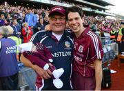 15 September 2013; Galway manager Tony Ward and his 1 month old grandson Oisin Helebert celebrate with Galway's Ann Marie Hayes. Liberty Insurance All-Ireland Senior Camogie Championship Final, Galway v Kilkenny, Croke park, Dublin. Photo by Sportsfile