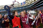 15 September 2013; Paula Kenny, left, from the victorious Galway Intermediate team, and Susan Earner, from the victorious Galway Senior team, celebrate with their respective cups after the game. Liberty Insurance All-Ireland Senior Camogie Championship Final, Galway v Kilkenny, Croke park, Dublin. Photo by Sportsfile