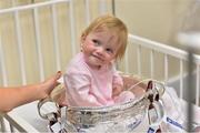 16 September 2013; 13-month-old Zoe Garry, from Ballinteer, Dublin, and the O'Duffy Cup on a visit by the All-Ireland Senior & Intermediate Camogie Champions, Galway, to Our Lady's Children's Hospital, Crumlin. Picture credit: Stephen McCarthy / SPORTSFILE