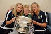 16 September 2013; Galway camogie stars Orla, left, and Niamh Kilkenny with Jack Fitzgibbon, age 9, from Kilmallock, Co. Limerick, and the O'Duffy Cup on a visit by the All-Ireland Senior & Intermediate Camogie Champions to Our Lady's Children's Hospital, Crumlin. Picture credit: Stephen McCarthy / SPORTSFILE