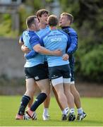 16 September 2013; Leinster players, from left, Cian Healy, Quinn Roux, Brendan Macken and Jordi Murphy during a squad training session ahead of their Celtic League 2013/14, Round 3, match against Glasgow Warriors on Friday. Leinster Rugby Squad Training and Press Briefing, UCD, Belfield, Dublin. Picture credit: Brendan Moran / SPORTSFILE