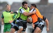 16 September 2013; Connacht's Ronan Loughney is tackled  by Rodney Ah You during squad training ahead of their Celtic League 2013/14, Round 3 match against Ulster on Saturday. Connacht Rugby Squad Training, The Sportsground, Galway. Picture credit: Diarmuid Greene / SPORTSFILE