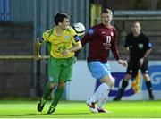 16 September 2013; Peter Hynes, Drogheda United, in action against Josh Mailey, Finn Harps. FAI Ford Cup Quarter-Final Replay, Drogheda United v Finn Harps, Hunky Dorys Park, Drogheda, Co. Louth. Photo by Sportsfile