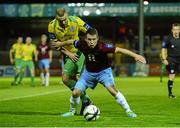 16 September 2013; Philip Hand, Drogheda United, in action against Damien McNulty, Finn Harps. FAI Ford Cup Quarter-Final Replay, Drogheda United v Finn Harps, Hunky Dorys Park, Drogheda, Co. Louth. Photo by Sportsfile