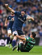 4 May 2024; Ryan Baird of Leinster is tackled by Alex Mitchell of Northampton Saints during the Investec Champions Cup semi-final match between Leinster and Northampton Saints at Croke Park in Dublin. Photo by Brendan Moran/Sportsfile