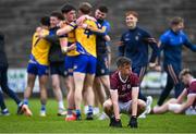 4 May 2024; Niall Mannion of Galway reacts as Roscommon players celebrate after the Connacht GAA Football U20 Championship final match between Roscommon and Galway at Hastings Insurance MacHale Park in Castlebar, Mayo. Photo by Ben McShane/Sportsfile