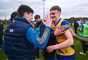 4 May 2024; Eoghan Carthy of Roscommon celebrates with supporters after the Connacht GAA Football U20 Championship final match between Roscommon and Galway at Hastings Insurance MacHale Park in Castlebar, Mayo. Photo by Ben McShane/Sportsfile