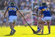 4 May 2024; Dessie Hutchinson of Waterford passes under pressure from Cathal Barrett of Tipperary, 17, during the Munster GAA Hurling Senior Championship Round 3 match between Waterford and Tipperary at Walsh Park in Waterford. Photo by Piaras Ó Mídheach/Sportsfile
