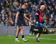 4 May 2024; Ciarán Frawley of Leinster leaves the pitch with Leinster team doctor and exercise medicine consultant Dr Jim McShane during the Investec Champions Cup semi-final match between Leinster and Northampton Saints at Croke Park in Dublin. Photo by Brendan Moran/Sportsfile