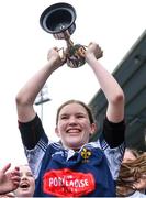 4 May 2024; Portlaoise captain Lily Brophy lifts the cup after her side's victory in the Leinster Rugby Bank of Ireland Girls Youth Finals Day match between Portlaoise and Naas/ Mullingar at Energia Park in Dublin. Photo by Shauna Clinton/Sportsfile