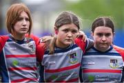 4 May 2024; Naas/ Mullingar players dejected after their side's defeat in the Leinster Rugby Bank of Ireland Girls Youth Finals Day match between Portlaoise and Naas/ Mullingar at Energia Park in Dublin. Photo by Shauna Clinton/Sportsfile