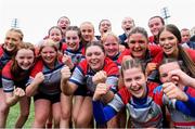 4 May 2024; Mullingar players celebrate after their side's victory in the Leinster Rugby Bank of Ireland Girls Youth Finals Day match between Mullingar and Rhinos at Energia Park in Dublin. Photo by Shauna Clinton/Sportsfile