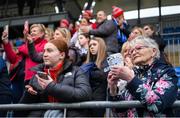 4 May 2024; Supporters look on as the Mullingar players celebrate their victory in the Leinster Rugby Bank of Ireland Girls Youth Finals Day match between Mullingar and Rhinos at Energia Park in Dublin. Photo by Shauna Clinton/Sportsfile