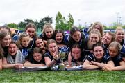 4 May 2024; Athy/ Wexford Wanderers players celebrate after their side's victory in the Leinster Rugby Bank of Ireland Girls Youth Finals Day match between Portdara and Athy/ Wexford Wanderers at Energia Park in Dublin. Photo by Shauna Clinton/Sportsfile