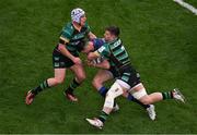 4 May 2024; Robbie Henshaw of Leinster is tackled by Curtis Langdon, left, and Sam Graham of Northampton Saints during the Investec Champions Cup semi-final match between Leinster and Northampton Saints at Croke Park in Dublin. Photo by Stephen McCarthy/Sportsfile