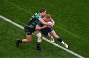 4 May 2024; Ciarán Frawley of Leinster is tackled by James Ramm of Northampton Saints during the Investec Champions Cup semi-final match between Leinster and Northampton Saints at Croke Park in Dublin. Photo by Stephen McCarthy/Sportsfile