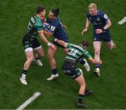 4 May 2024; James Lowe of Leinster is tackled by Northampton Saints players Tommy Freeman, left, and James Ramm during the Investec Champions Cup semi-final match between Leinster and Northampton Saints at Croke Park in Dublin. Photo by Stephen McCarthy/Sportsfile